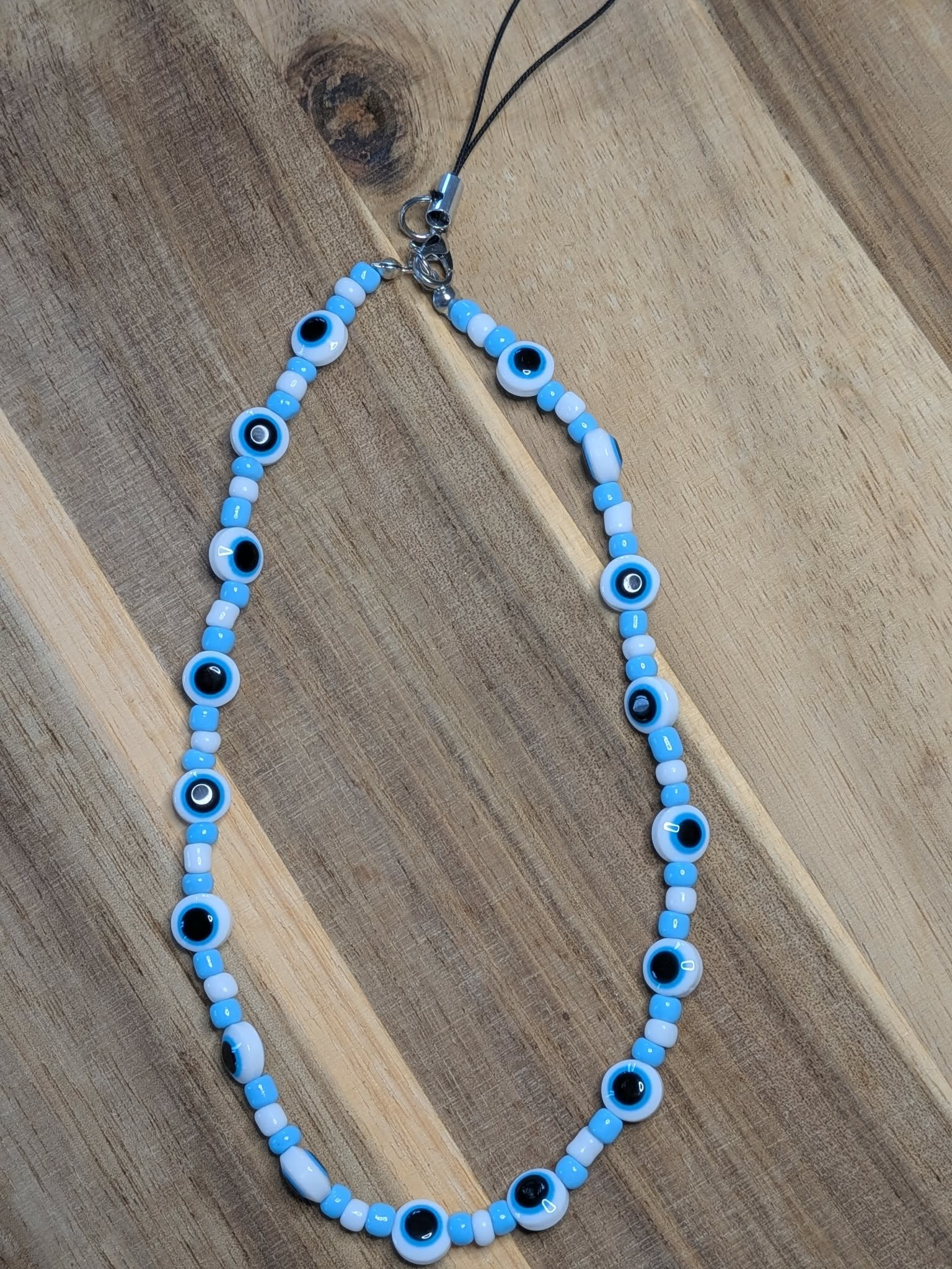 Modèle Œil de Protection (blanc)